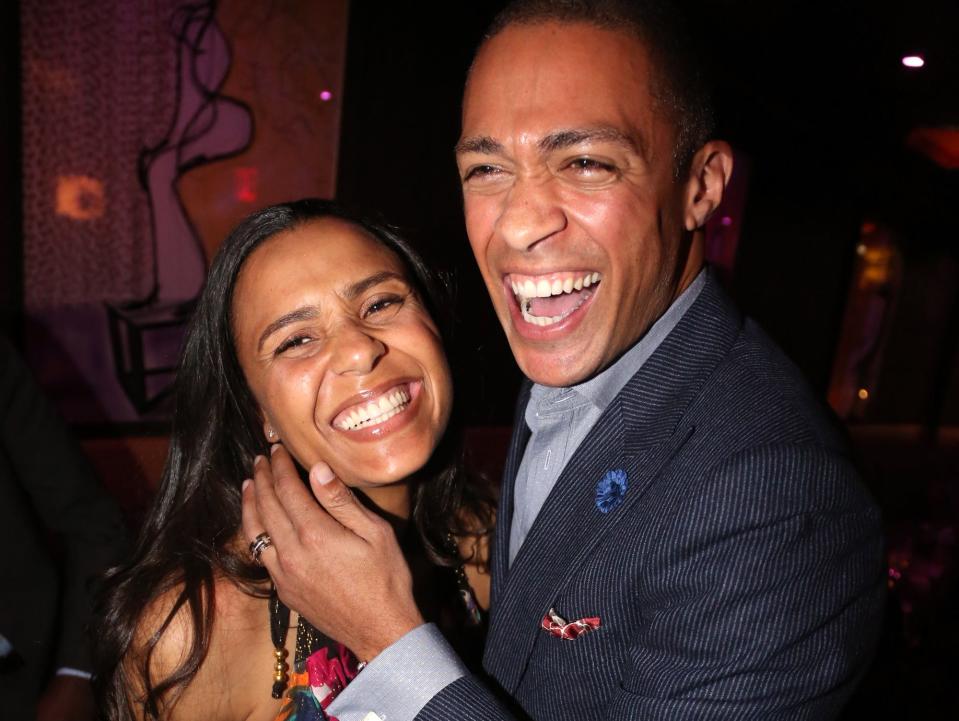 ournalist TJ Holmes (r) and wife Marilee Fiebig-Holmes attend the 2013 Black Girls Rock! Shot Caller Dinner at B & Co on October 25, 2013 in New York City