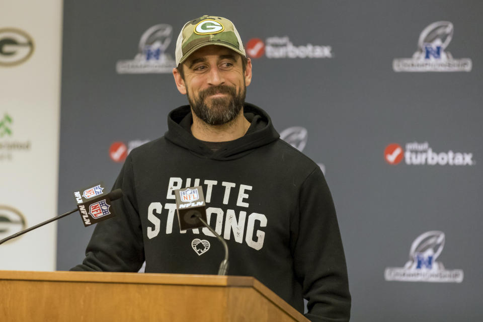 Green Bay Packers quarterback Aaron Rodgers smiles as he answers questions from the media Friday Jan. 17, 2020, in Green Bay, Wis. The Packers will play the San Francisco 49ers in the NFL football NFC Championship game on Sunday. (AP Photo/Mike Roemer)