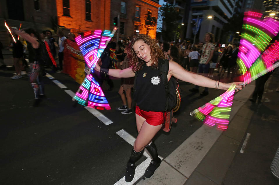 <p>A woman twirls lights as members of the gay community and their supporters celebrate the result of a postal survey calling for gay marriage right in Sydney, Australia, Wednesday, Nov. 15, 2017. (Photo: Rick Rycroft/AP) </p>