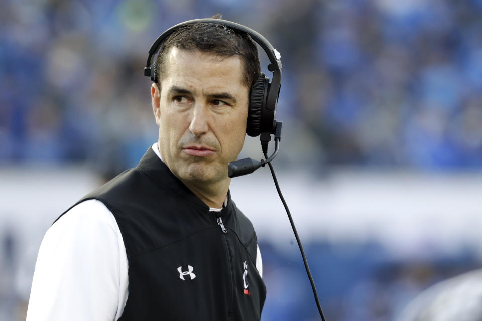 Cincinnati head coach Luke Fickell watches from the sideline during the first half of an NCAA college football game against Memphis for the American Athletic Conference championship Saturday, Dec. 7, 2019, in Memphis, Tenn. (AP Photo/Mark Humphrey)