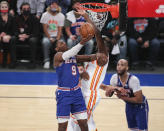 New York Knicks guard RJ Barrett (9) shoots against Atlanta Hawks center Clint Capela (15) during the first quarter of Game 5 of an NBA basketball first-round playoff series Wednesday, June 2, 2021, in New York. (Wendell Cruz/Pool Photo via AP)