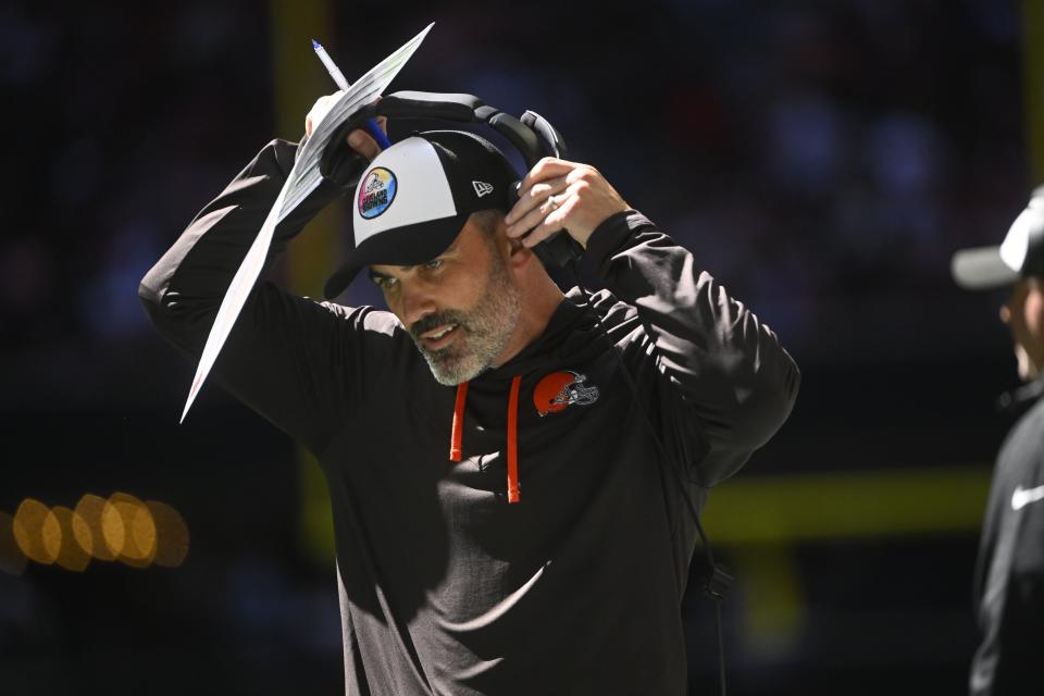 Cleveland Browns head coach Kevin Stefanski works on the sidelines against the Atlanta Falcons during the first half of an NFL football game, Sunday, Oct. 2, 2022, in Atlanta. (AP Photo/John Amis)