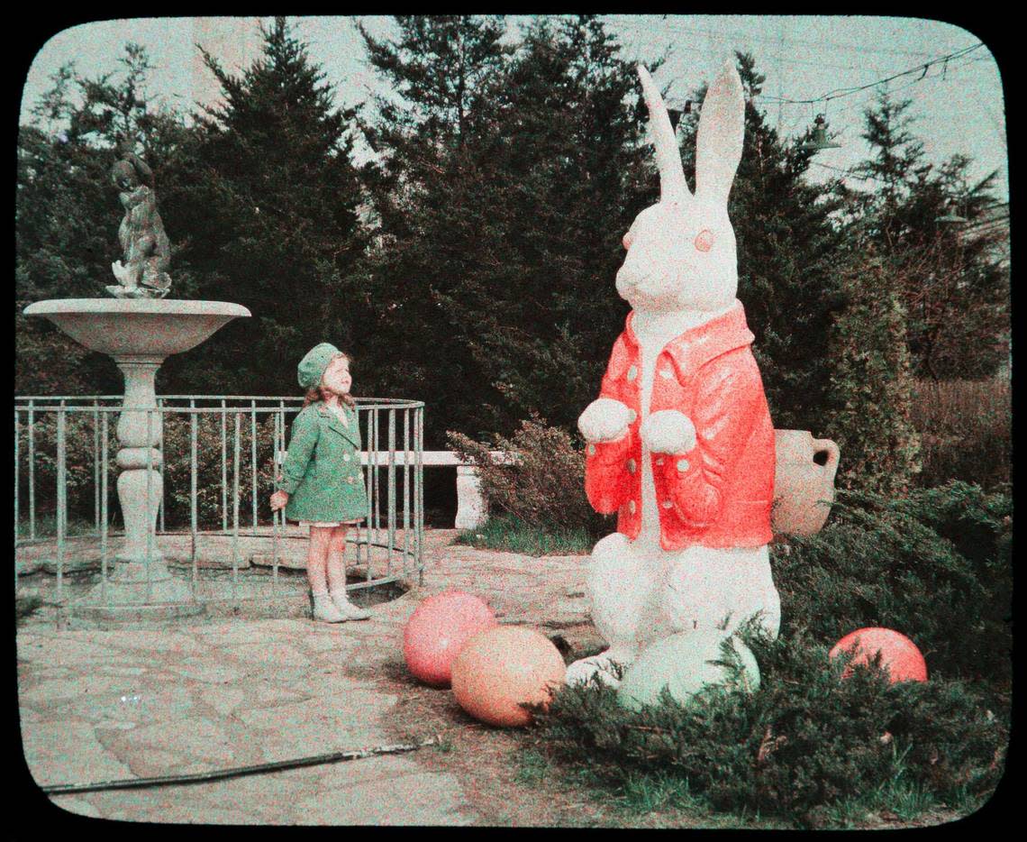 A young girl stands with one of the Plaza bunnies in 1934. Kansas City Public Library