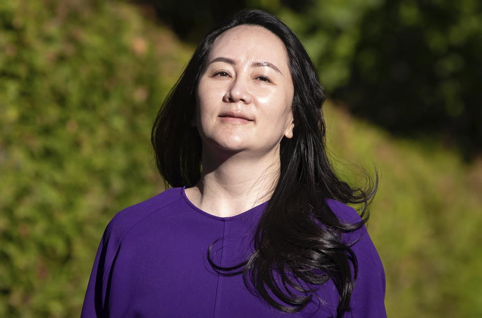 Meng Wanzhou, chief financial officer of Huawei, leaves her home to attend a court hearing in Vancouver, British Columbia, on Tuesday, Sept. 29, 2020. (Darryl Dyck/The Canadian Press via AP)