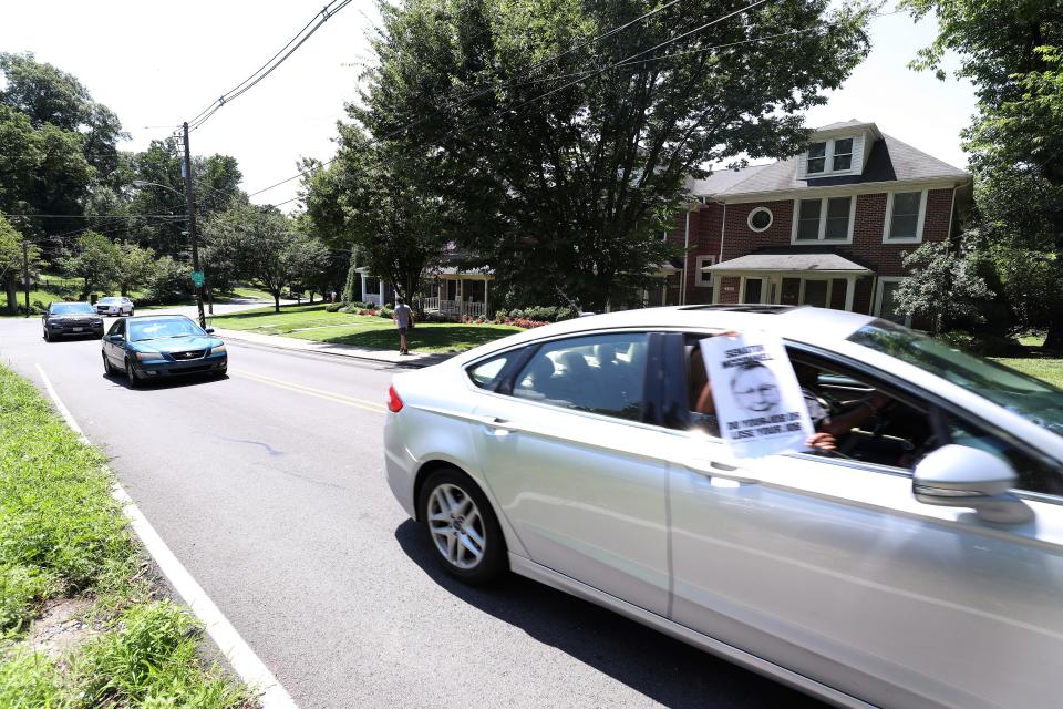 A caravan, organized by Unemployment Action in conjunction with the Kentucky State AFL-CIO, drove past the Louisville home of Sen. Mitch McConnell to demand reinstatement of unemployment benefits to people who have not been able to work because of the COVID-19 pandemic.