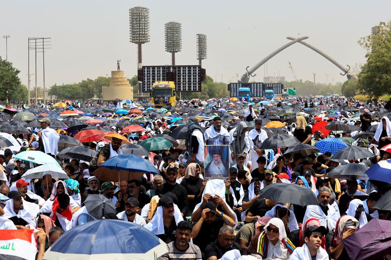 Supporters of Iraqi populist leader Moqtada al-Sadr gather for mass Friday prayer, in Baghdad