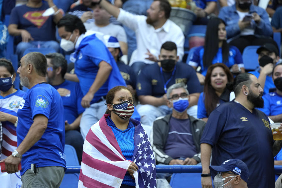 Fans wait for the start of a qualifying soccer match between El Salvador and United States for the FIFA World Cup Qatar 2022 at Cuscatlan stadium in San Salvador, El Salvador, Thursday, Sept. 2, 2021. (AP Photo/Moises Castillo)