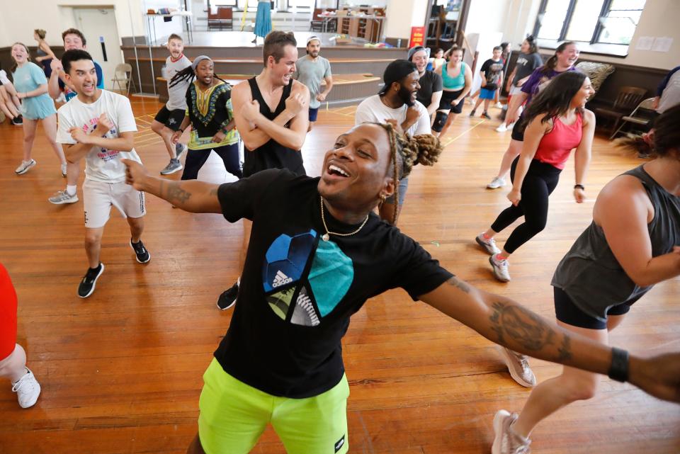 Lawrence Flowers, Joseph, and fellow cast members of Joseph and the Amazing Technicolor Dreamcoat rehearse at the First Unitarian Church in New Bedford in preparation for the July 21's opening at the Zeiterion Performing Arts Center.