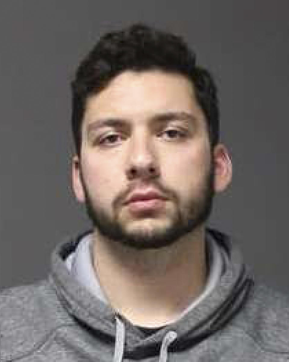 This image provided by University of Connecticut Police shows a Monday, Oct. 21, 2019 booking photo of Jarred Karal, of Plainville, Conn. Karal and another UConn student have been charged with shouting a racial slur outside a campus apartment complex in an episode that was caught on video and has led to protests at the school. (University of Connecticut Police via AP)