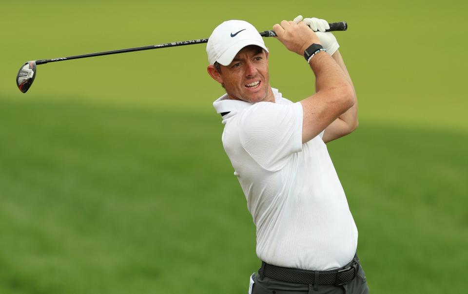 Rory McIlroy plays his second shot 10th hole during Day One of the Hero Dubai Desert Classic at Emirates Golf Club - Luke Walker/Getty Images