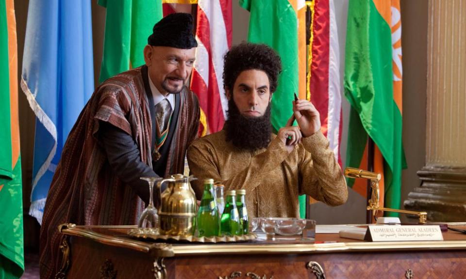 With Ben Kingsley in the film The Dictator, in which Sacha Baron Cohen plays Admiral General Aladeen, a character based on Muammar Gaddafi.