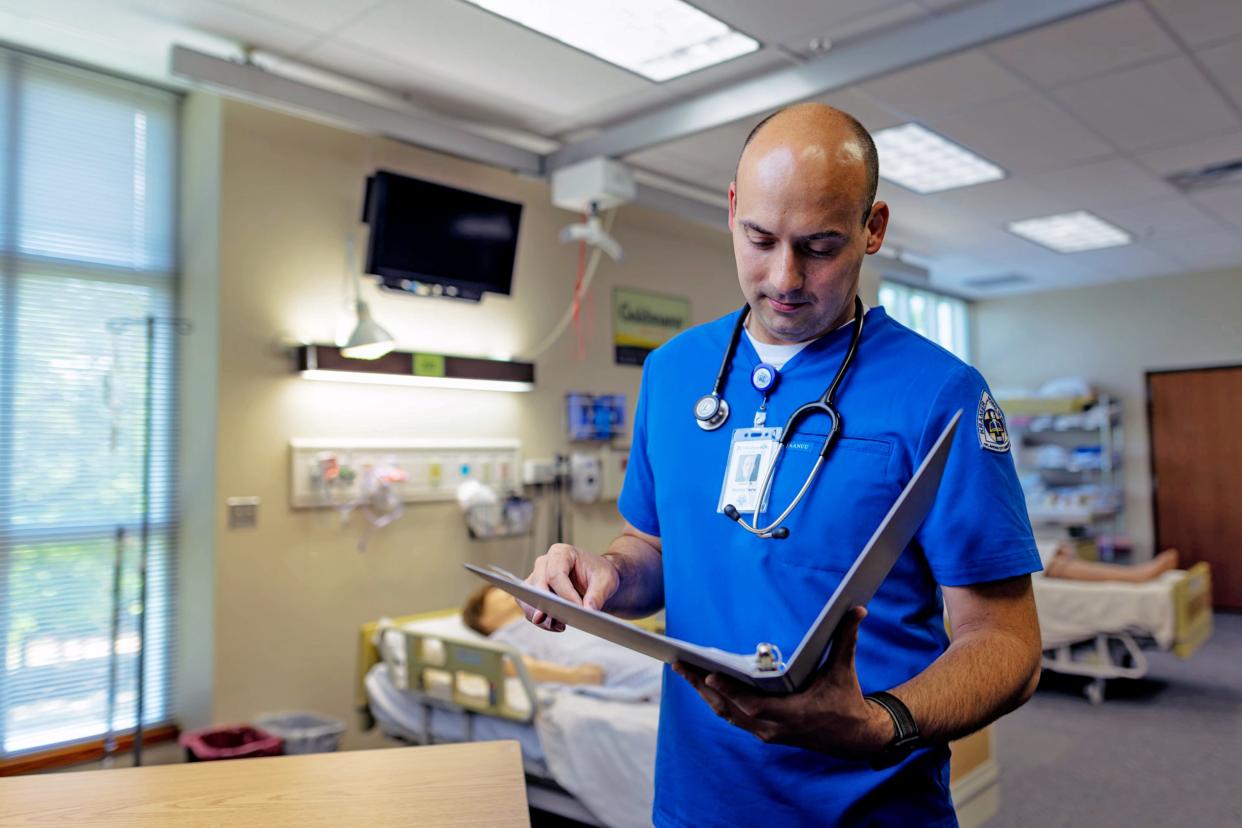 Oklahoma City University nursing student Albert Babarsky studies in one of the Kramer School of Nursing labs.