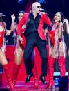 <p>Pitbull lights up the stage at Premios Juventud 2021 at Watsco Center on July 22 in Coral Gables, Florida.</p>