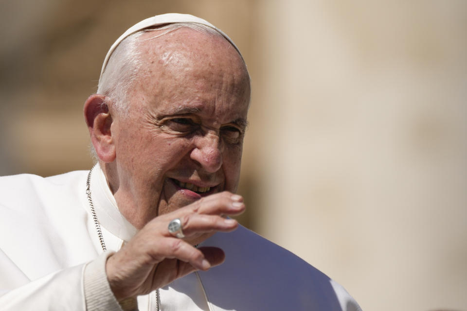 Pope Francis leaves at the end of his weekly general audience in St. Peter's Square, at the Vatican, Wednesday, April 26, 2023. (AP Photo/Alessandra Tarantino)