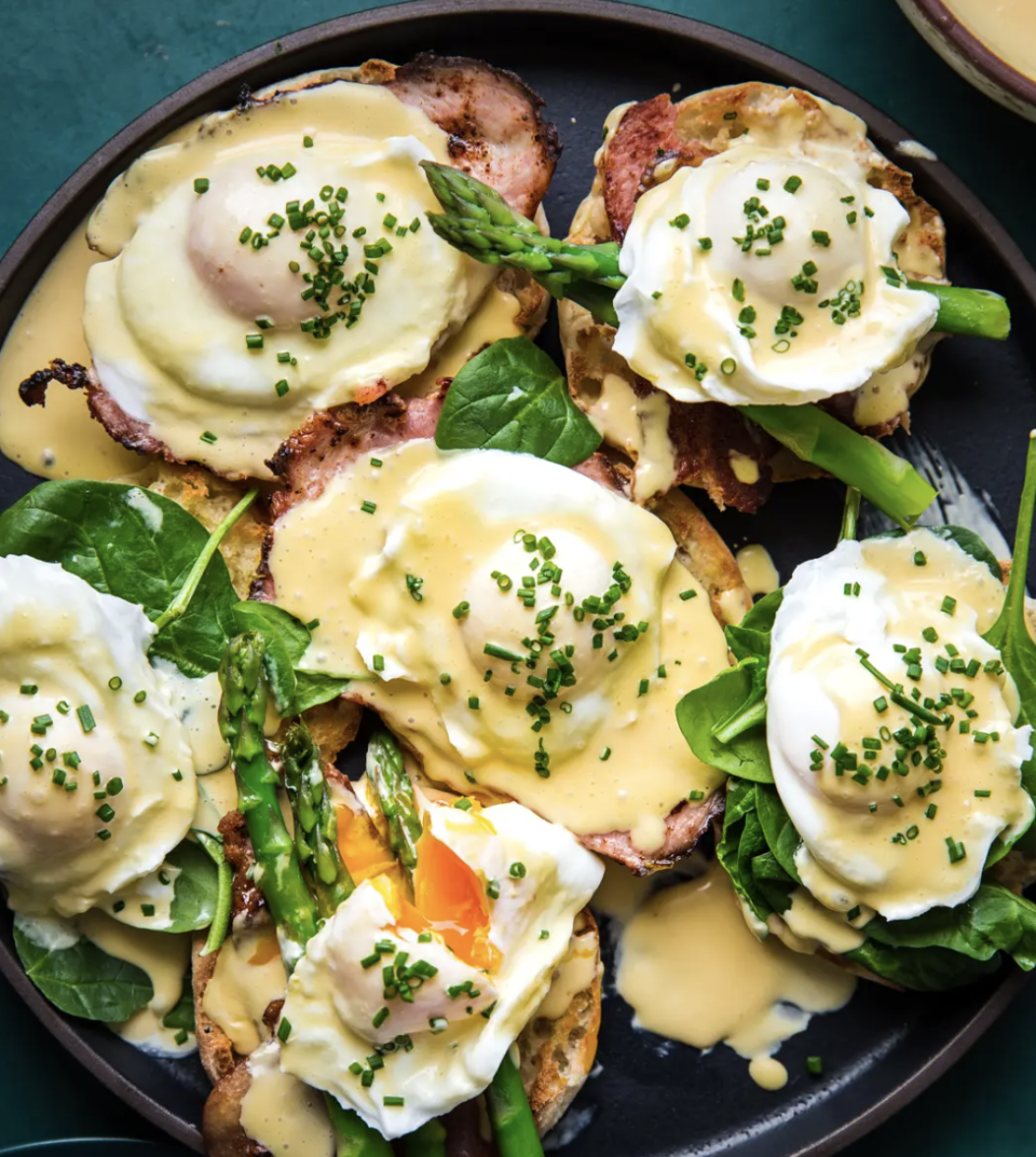 breakfast in bed eggs benedict with hollandaise sauce ham chives