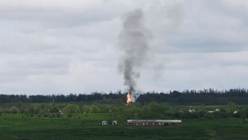 Fire and smoke raise after artillery shelling near Bakhmut, an eastern city where fierce battles between Ukrainian and Russian forces have been taking place, in the Donetsk region, Ukraine, Saturday, April 29, 2023.