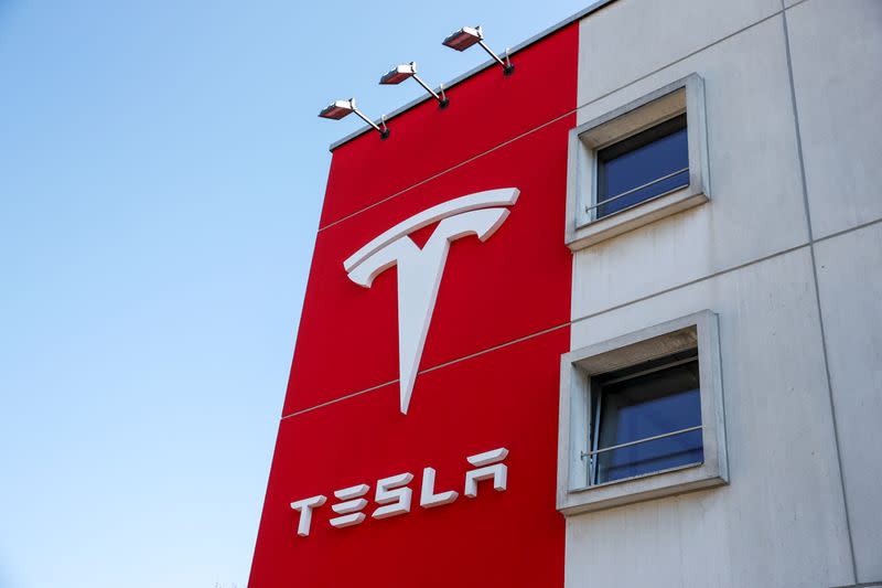 Logo of Tesla is seen at a branch office in Bern