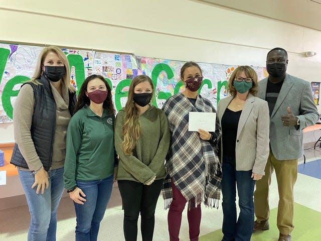 At Garrison Elementary School are , left to right, SEED rep Sue Vitko, Roseanna Drysdale, GES music teachers Erin Murphy and Sara LaPierre, and Julie Black and Markus Brave of SEED.