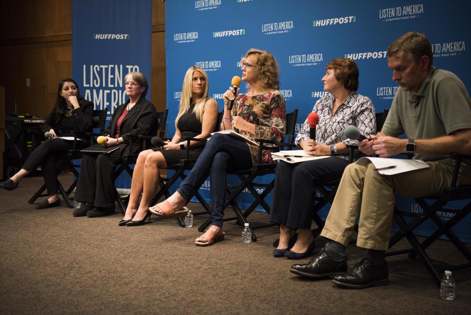 Moderator Rebecca Klein&nbsp;listens to panelists Laurie Johnson, Beth Bearman, Anne Duff, Karen Francisco and Mark Berends during the "Vouchers: The Economics and Academics of Choice" discussion.