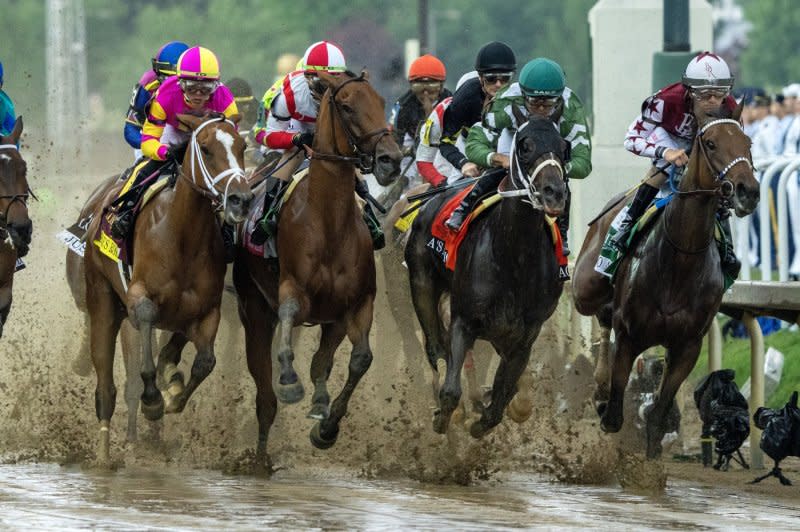 Thorpedo Anna (R), ridden by Brian Heernandez Jr., leads thee pack at the first turn on her way to winning the Kentucky Oaks at Churchill Downs in Louisville, Ky., on Friday, Photo by Pat Benic/UPI