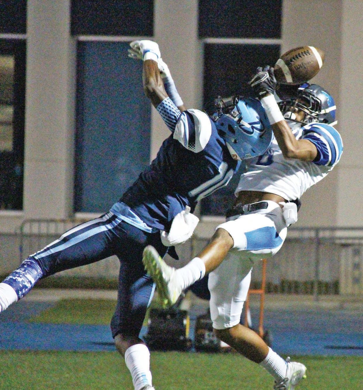 Just as David Baker at Bartlesville College High 60 years earlier, A.J. Parker, left, of Bartlesville High shut down the deep passing game of opponents in 2015. Both Baker and Parker went on to play defensive back in the NFL. Parker is early in his pro career, coming back this summer to the Detroit Lions training camp after he turned in a successful rookie campaign in 2021. Baker played from 1959-61 for the San Francisco 49ers and earned All-Pro honors. The pair also played college football at future Big 12 schools (Baker at Oklahoma, Parker at Kansas State) and made their marks as punishing tacklers and lock-the-door pass coverage.