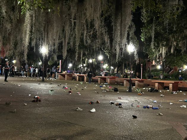 Shoes and other personal items are seen scattered on the ground following Monday night's vigil.