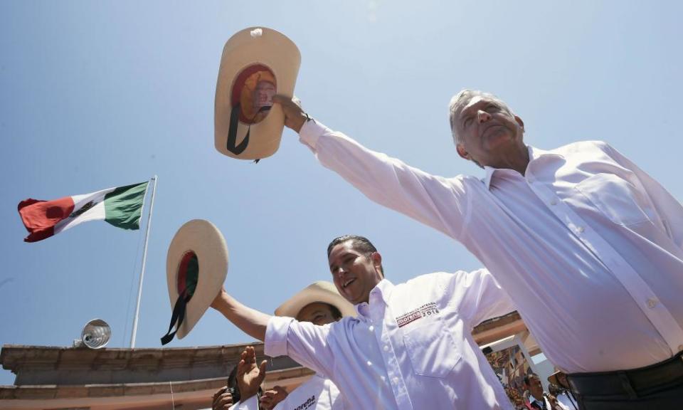 Andrés Manuel López Obrador, right campaigns for the presidency in Michoacan state in May 2018 with a slogan of ‘hugs, not bullets’. Mexico has recorded 150,000 murders since his election.