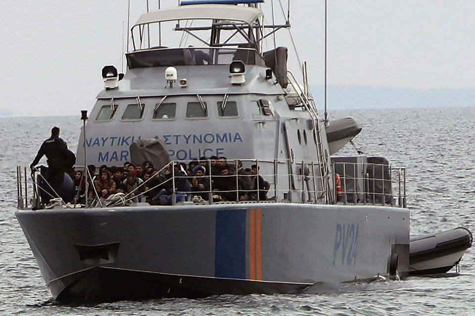 FILE - Migrants aboard a Cyprus marine police patrol boat as they're brought to a harbor after being rescued from their own vessel off the Mediterranean island nation's southeastern coast of Protaras, Cyprus, Tuesday, Jan. 14, 2020. The number of Syrian refugees leaving Lebanon is likely to keep rising, the head of a top international agency working with migrants warned Tuesday, April 30, 2024, as pressure builds due to their arrival on the Mediterranean island of Cyprus. (AP Photo/Petros Karadjias, File)