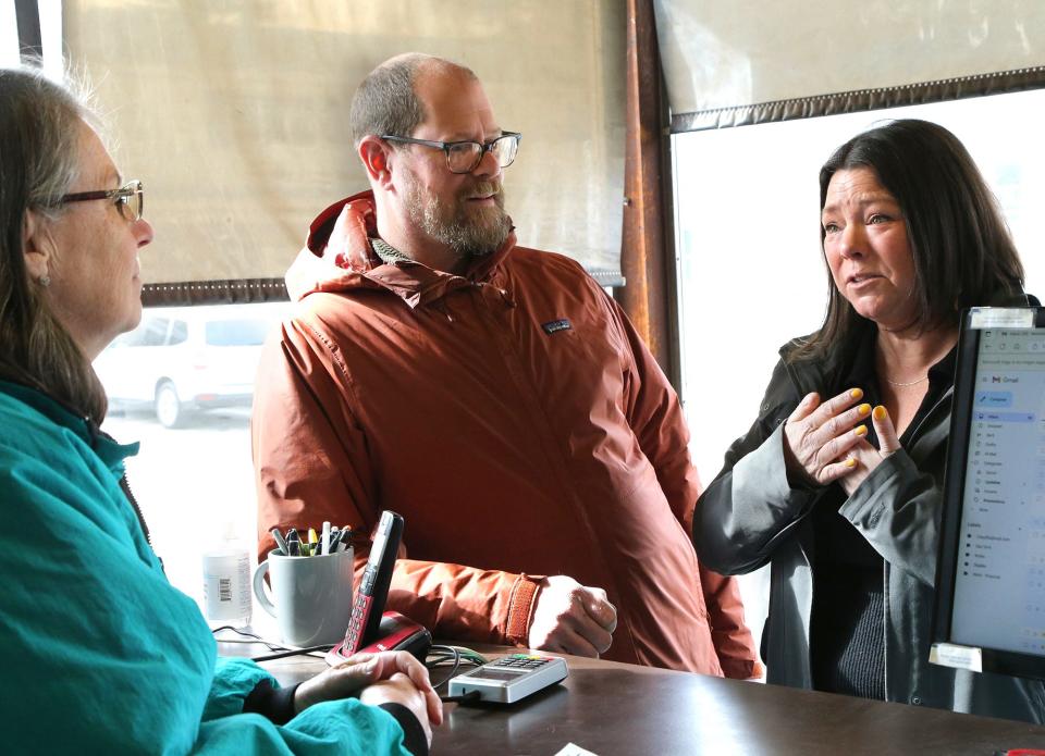 Shannon Hill, right, gets emotional while speaking with Best Automotive owner Cissy Furbish about her selling the property to her and Jarrod Spangler, owners of Maine Meat. The three are seen at Best Automotive Monday, March 11, 2024.