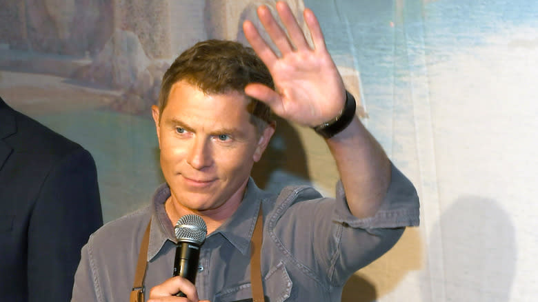 Bobby Flay waving his hand