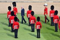 <p>Another view of Biden inspecting the guard of honour. </p>