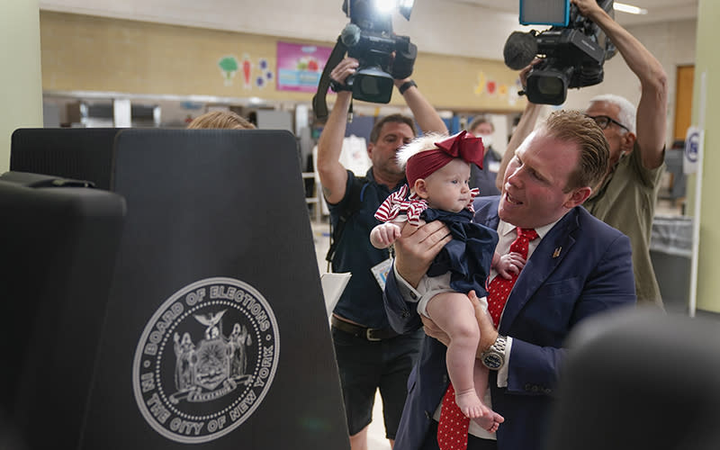 New York Republican gubernatorial candidate Andrew Giuliani kisses his daughter
