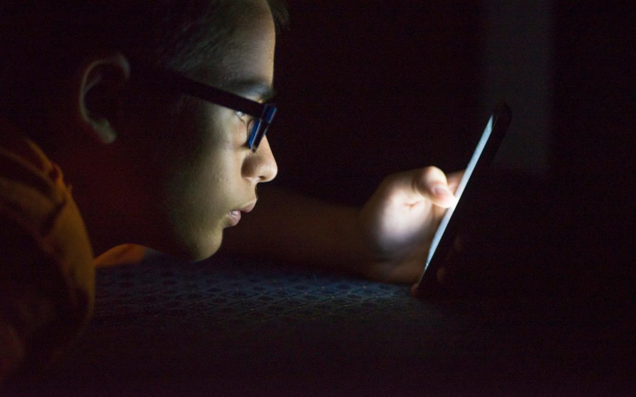 Overall, screen time was linked with unhappiness - Getty Images Contributor