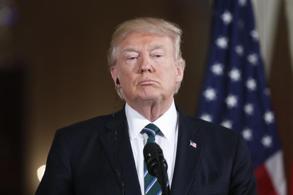 President Donald Trump listens during a joint news conference with German Chancellor Angela Merkel in the East Room of the White House in Washington, Friday, March 17, 2017. (AP Photo/Pablo Martinez Monsivais)