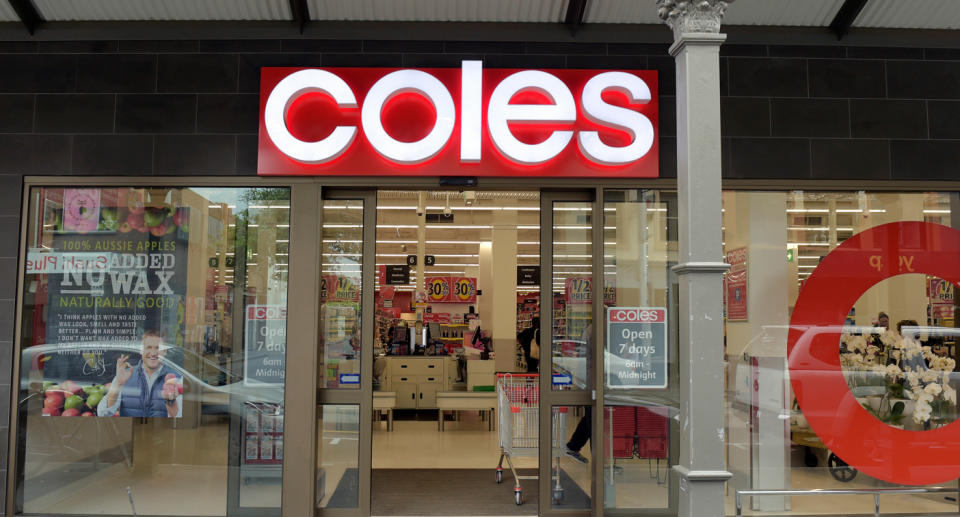 Photo shows the front of a Coles supermarket.