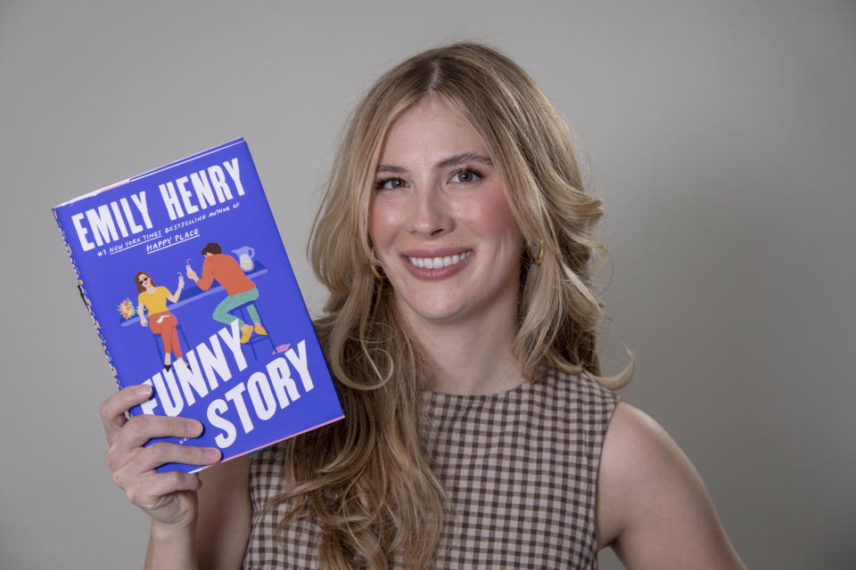 Emily Henry poses for a portrait on Tuesday, April 23, 2024, in New York. (Photo by Andy Kropa/Invision/AP)