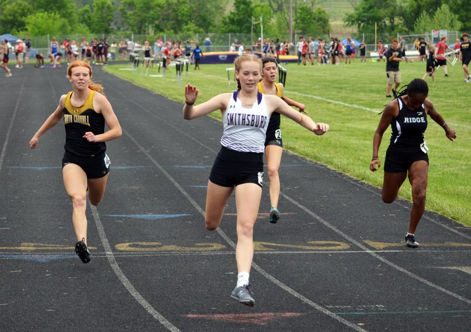 Smithsburg's Jenna Howe wins the first of two heats of the girls 100-meter finals during the 1A West championships. She finished sixth overall in 13.34 seconds, and then later took second in the 200 in 26.92.