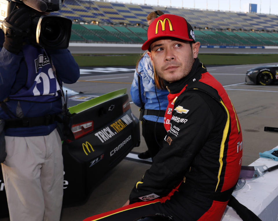 NASCAR Cup Series driver Kyle Larson watches the leaderboard during qualifying for this weekend's auto race at Kansas Speedway in Kansas City, Kan., Friday, Oct. 19, 2018. Larson lost his appeal of a rules violation from last week's race. (AP Photo/Colin E. Braley)