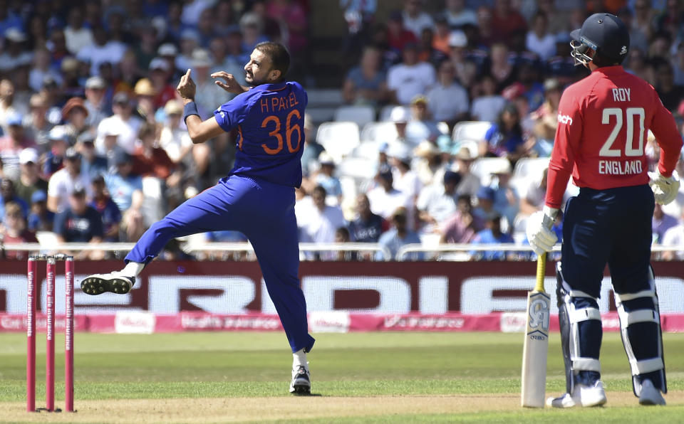 India's Harshal Patel, left, attempts to catch off his bowling during the third T20 international cricket match between England and India at Trent Bridge in Nottingham, England, Sunday, July 10, 2022. (AP Photo/Rui Vieira)