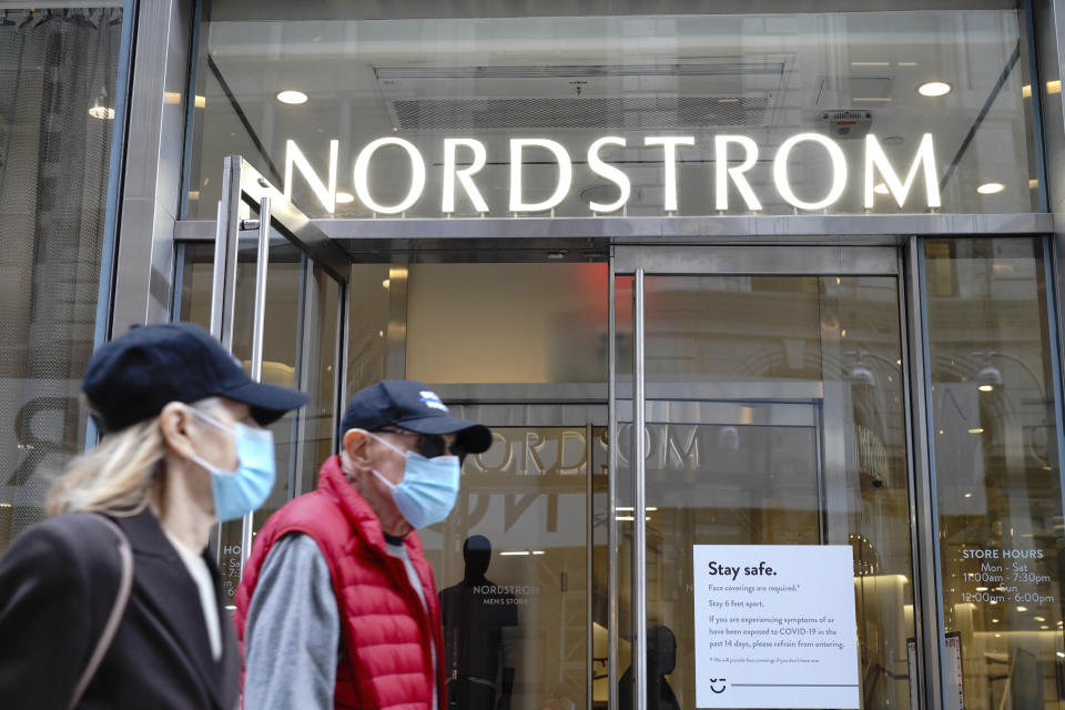 Photo by: John Nacion/STAR MAX/IPx 2020 10/27/20 A view of people with masks on, walking past a Nordstrom Department Store in Midtown. New York City continues Phase 4 of re-opening following restrictions imposed to slow the spread of coronavirus on October 27, 2020 in New York City. The fourth phase allows outdoor arts and entertainment, sporting events without fans and media production.