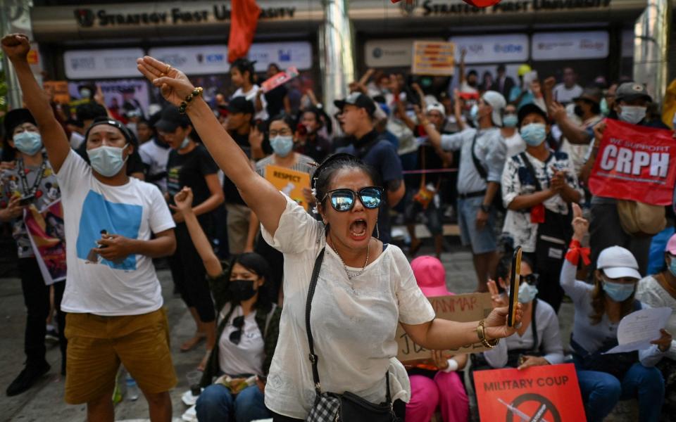 Protesters take part in a demonstration against the military coup in Yangon - YE AUNG THU /AFP