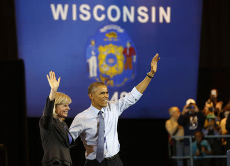 U.S. President Barack Obama attends a campaign event with Democratic candidate for Wisconsin Gov. Mary Burke while at North Division High School in Milwaukee October 28, 2014. REUTERS/Larry Downing
