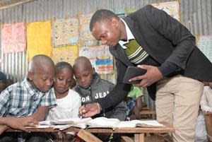 Students and teacher at a NewGlobe-supported school in Kenya