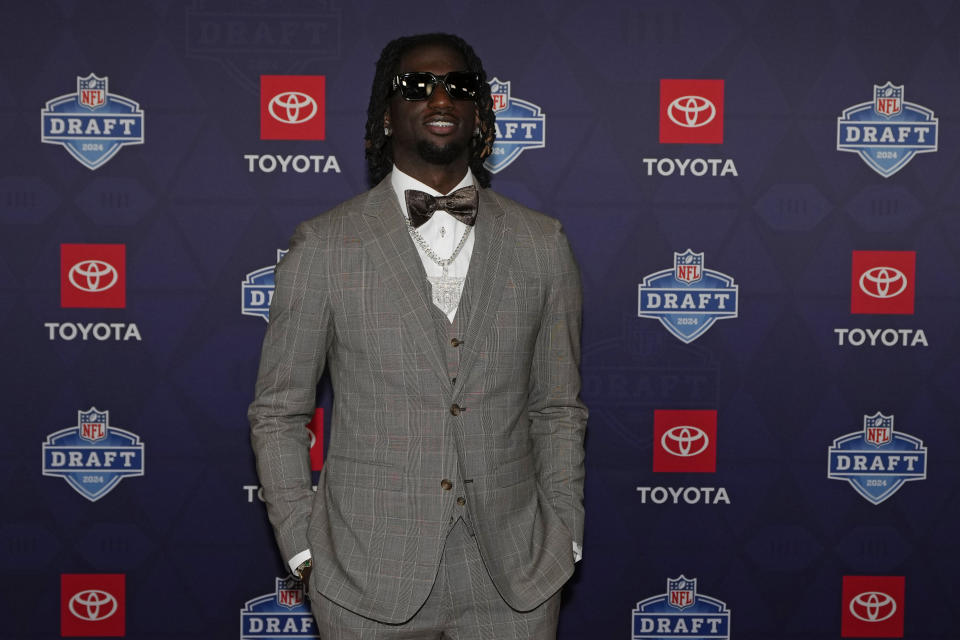 LSU wide receiver Brian Thomas Jr. poses on the red carpet ahead of the first round of the NFL football draft, Thursday, April 25, 2024, in Detroit. (AP Photo/Carlos Osorio)