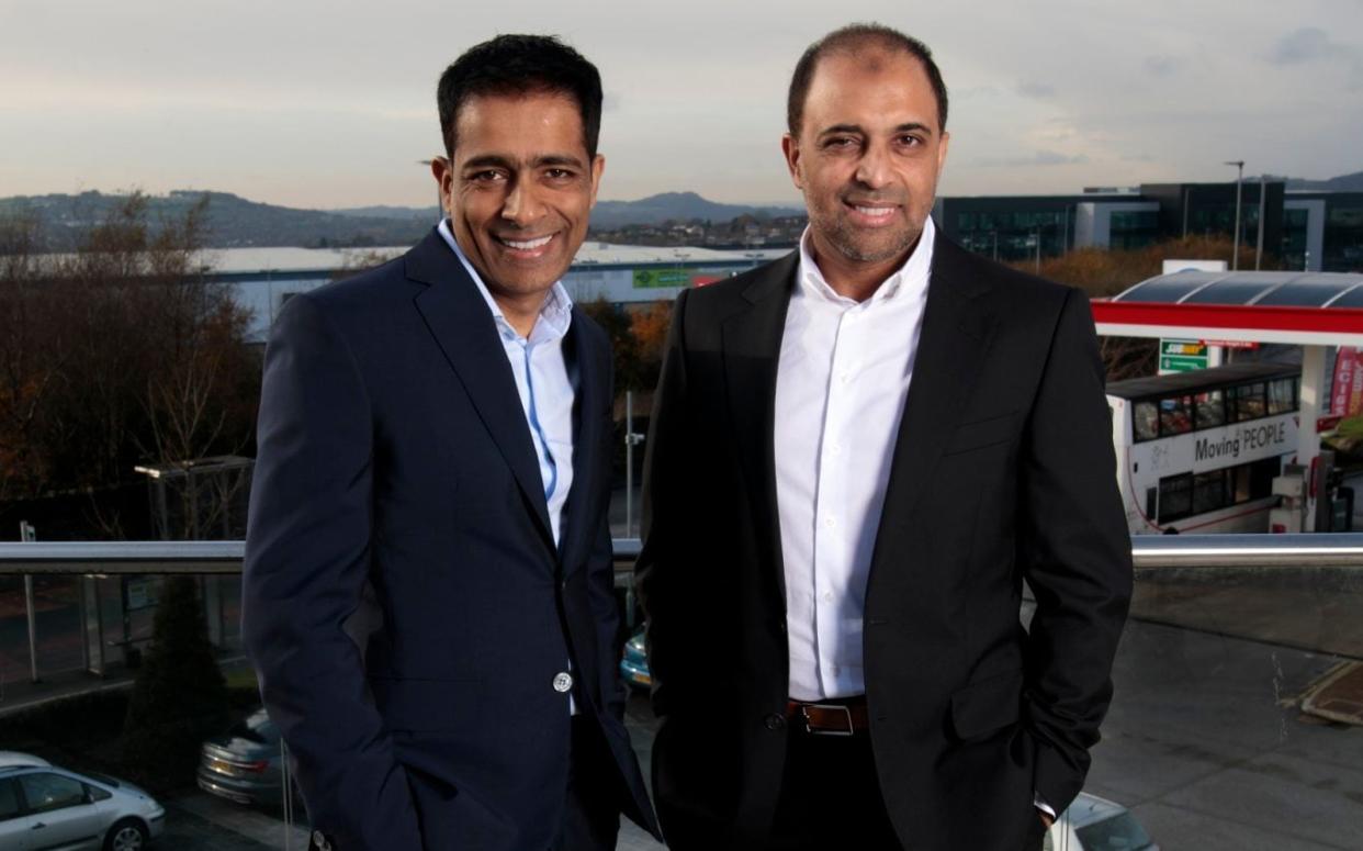 Zuber Issa, right, has sold his stake in Asda to TDR Capital