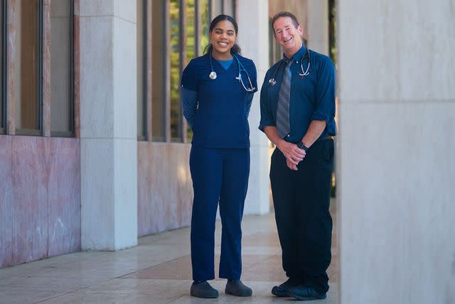 <p>Milo Mitchell/UCLA Heath</p> Tae Butler with Dr. Ted Moore at UCLA Health on July 13.