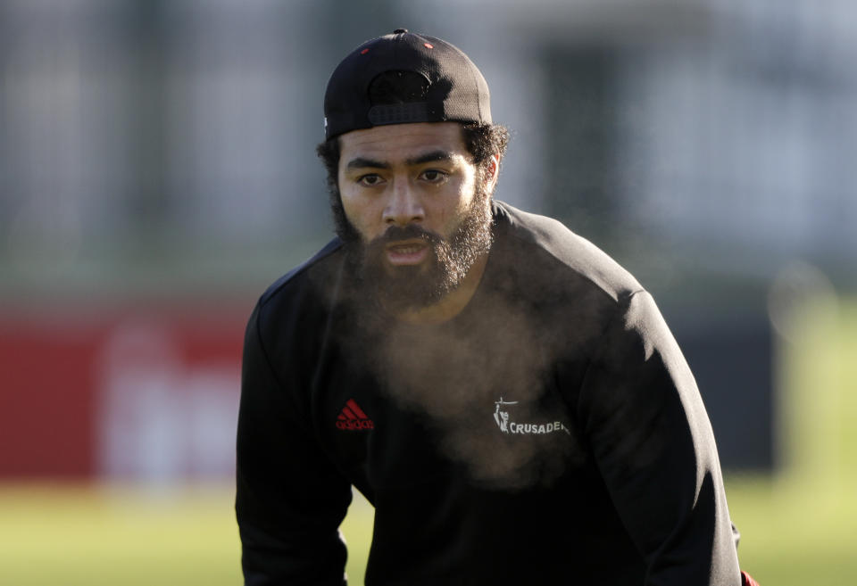 Crusaders Richie Mo'unga watches the ball during a training session at Rugby Park in Christchurch, New Zealand, Wednesday, May 27, 2020. New Zealand's Super Rugby Aotearoa will start on June 13 in a new five-team, 10-week competition. (AP Photo/Mark Baker)