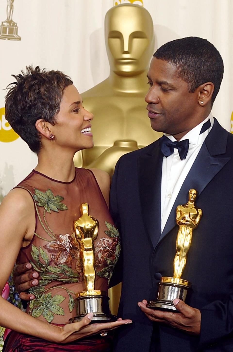 <div class="inline-image__caption"><p>Denzel Washington and Halle Berry hold their Oscars after winning the award for Best Actor and Actress in a Leading Role on March 24, 2002, at the 74th Academy Awards at the Kodak Theatre in Hollywood, California.</p></div> <div class="inline-image__credit">Mike Nelson/AFP/Getty</div>