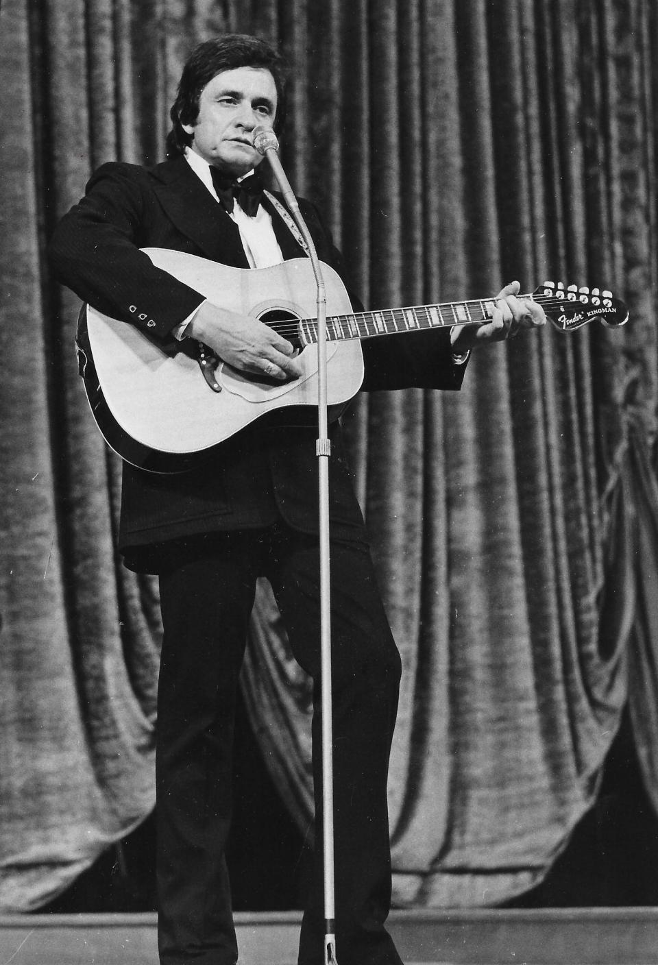 Country star Johnny Cash performs at the Cathedral of Tomorrow in August 1973.