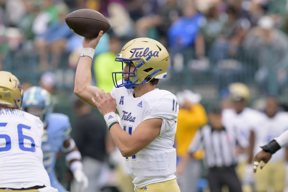 Tulsa quarterback Kirk Francis (11) throws during the first half of an NCAA college football game against Tulane in New Orleans, Saturday, Nov. 11, 2023. (AP Photo/Matthew Hinton)